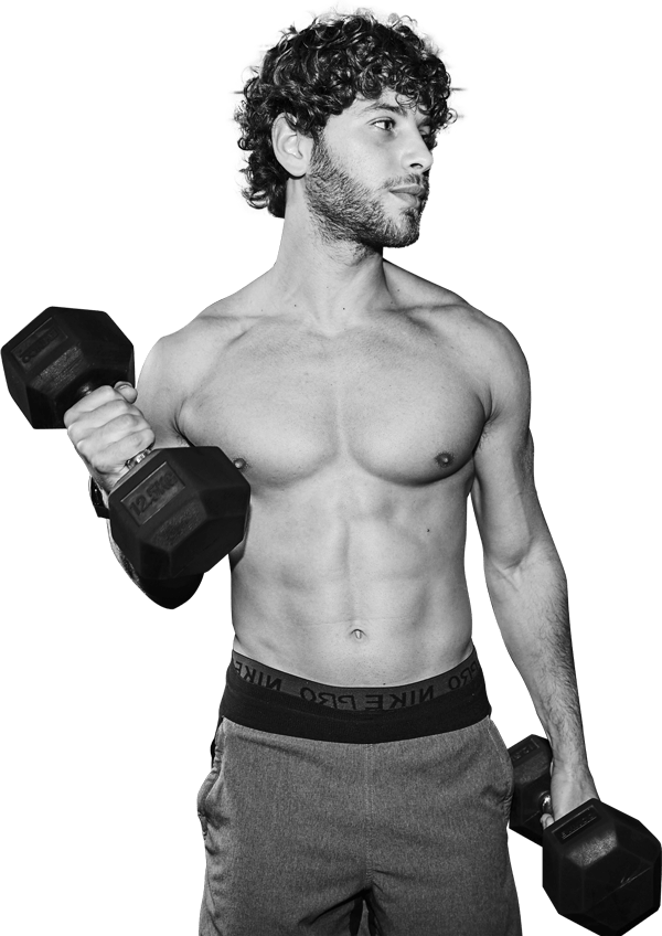 Eyal Booker working out with 2 dumbbells